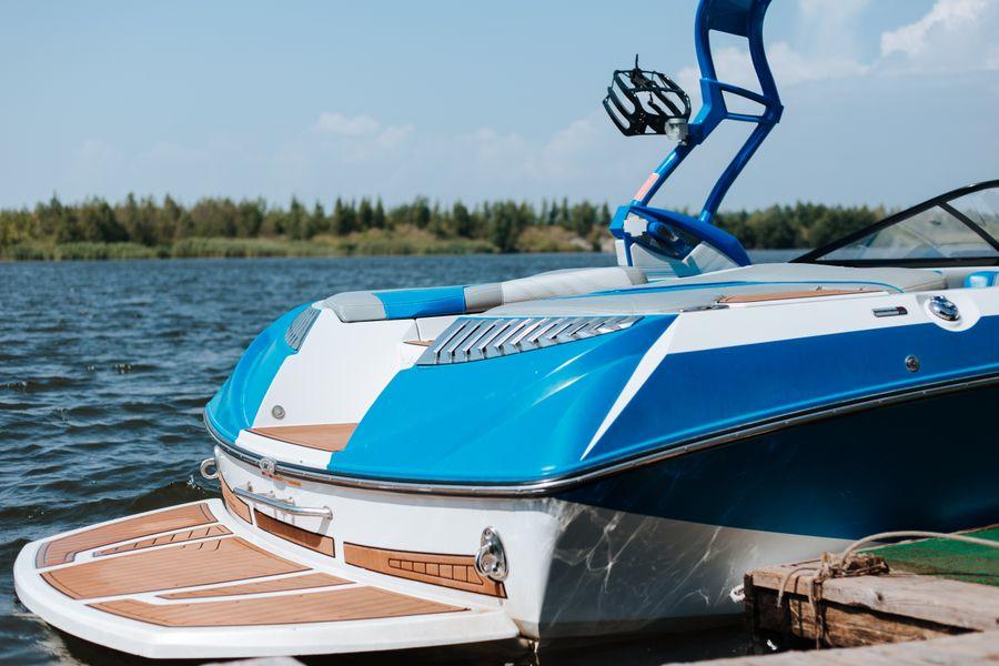 Clean boat tied up at a Bass Lake dock