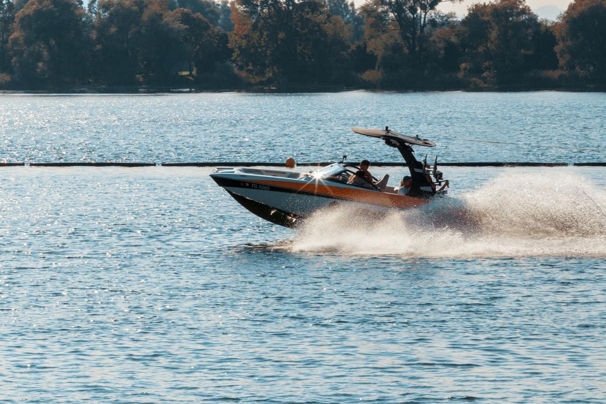 Boat on the water at Bass Lake in the California Sierra
